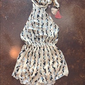 Sage high neck, open back romper with fringe ties